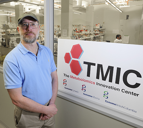 Professor David Wisharts stands in front of the Metabolomics Innovation Centre (TMIC) 