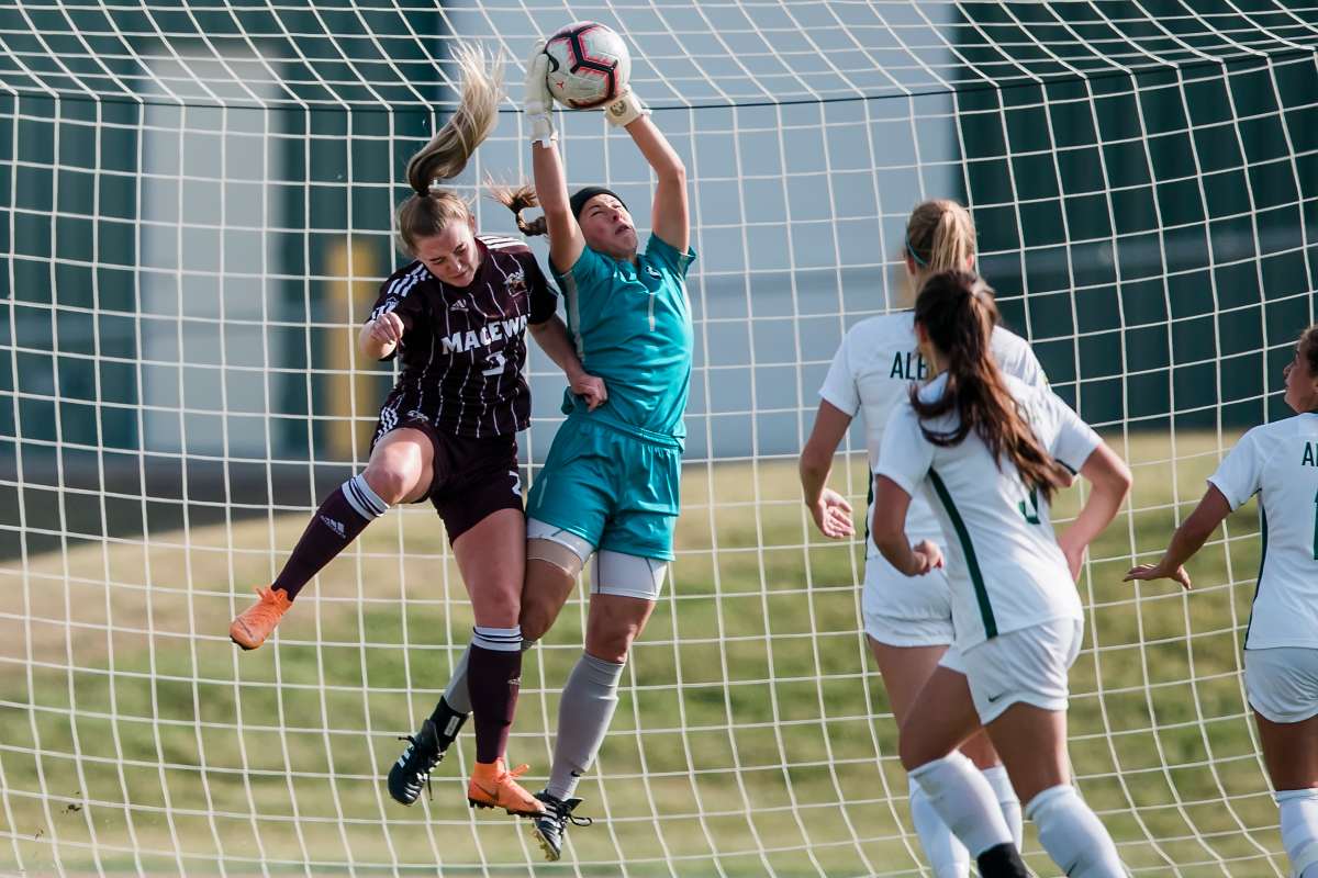 Academic All-Canadian and Pandas starting goalkeeper Ashley Turner makes a save in a game of soccer.
