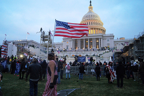 A photo of Trump supporters in front of capitol hill. Image via Tyler Merbler (Flickr). 