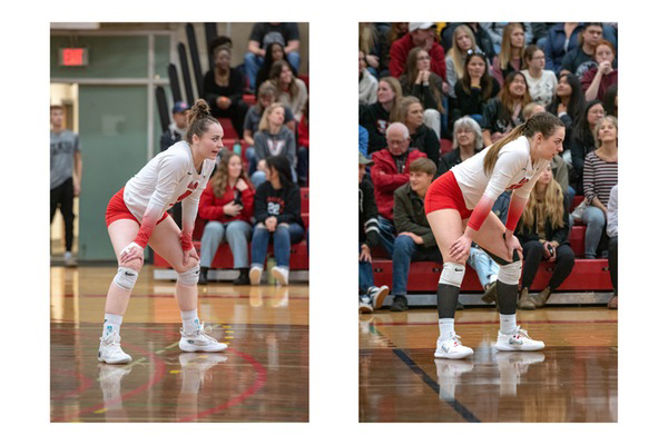 Shae Boyes and Emily Peterson on the volleyball court during a game.
