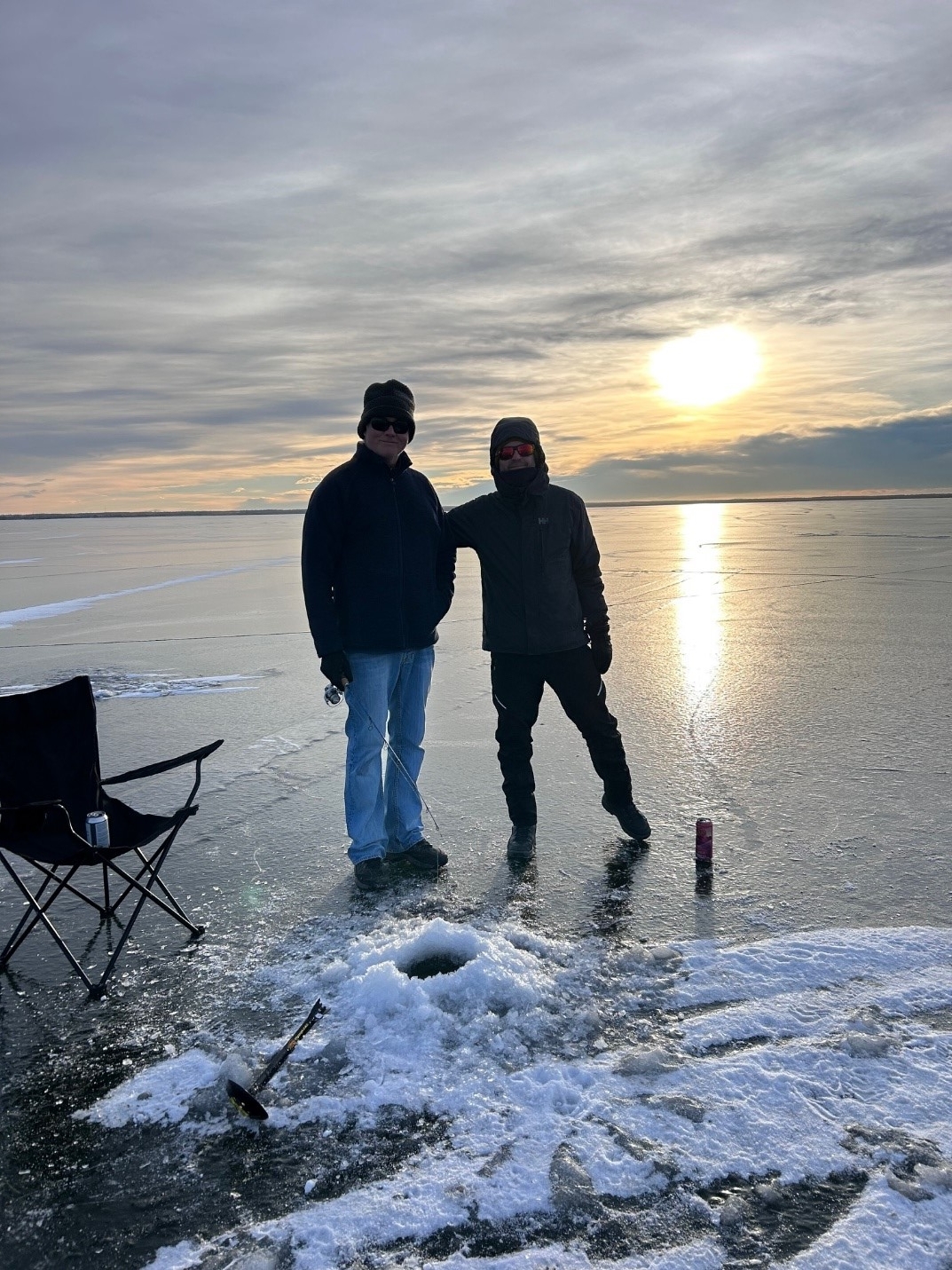 two men ice fishing