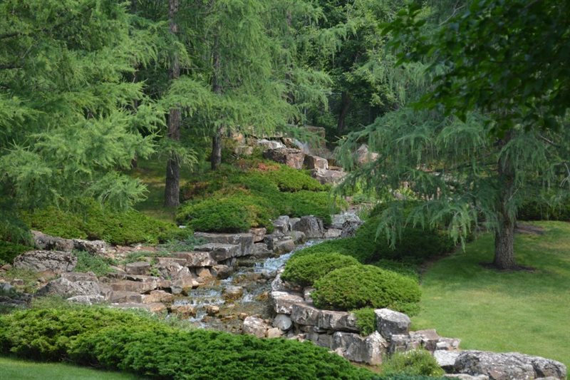 Kurimoto Japanese Garden in Summer, image of waterfall.