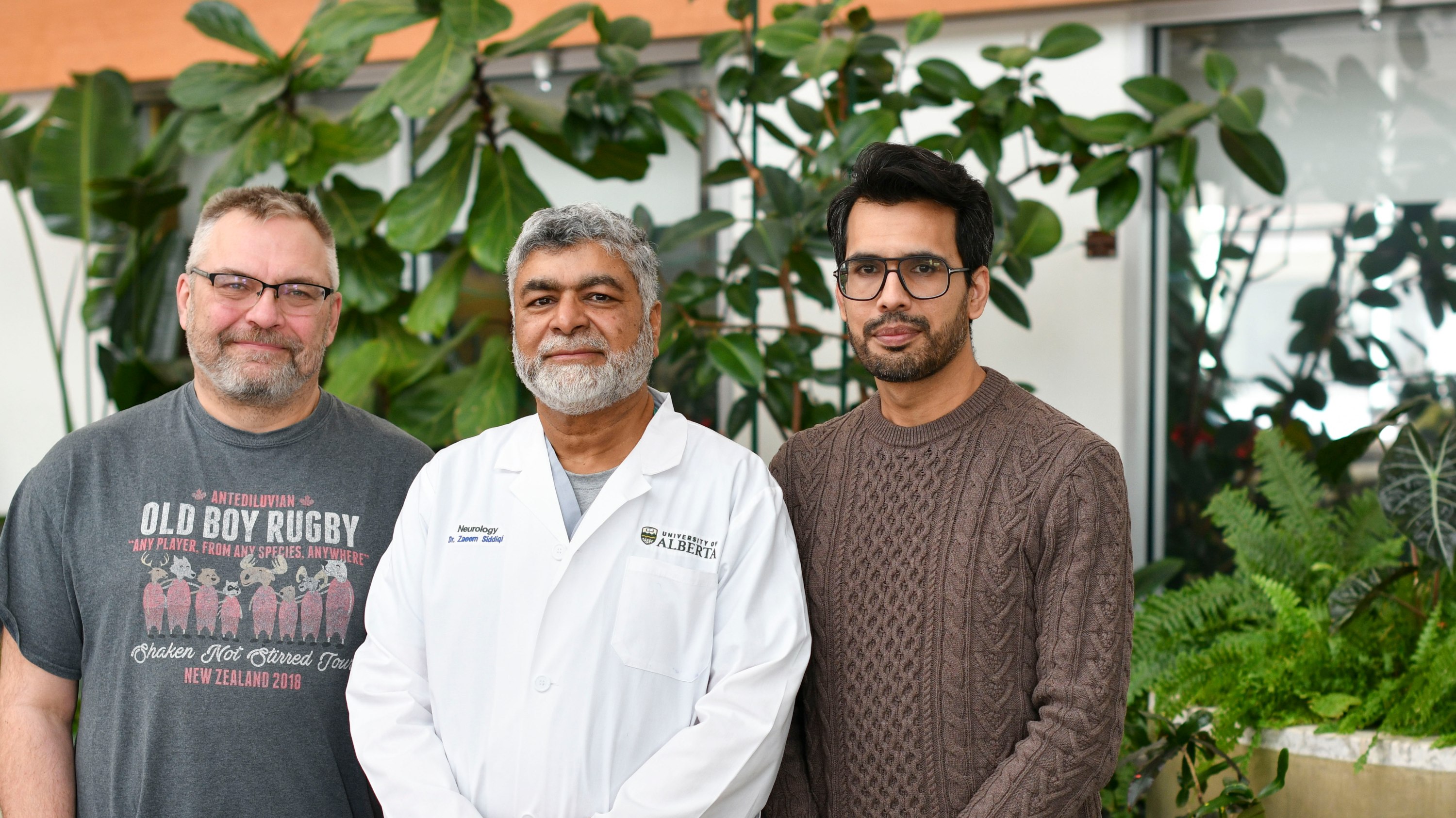 Neurologist Zaeem Siddiqi (centre) with biochemistry professor Richard Fahlman (left) and neurology post-doctoral fellow Faraz Hussain. Their research revealed a blood biomarker for myasthenia gravis and could lead to a simpler, faster test to diagnose the potentially fatal disease and get patients into treatment sooner.