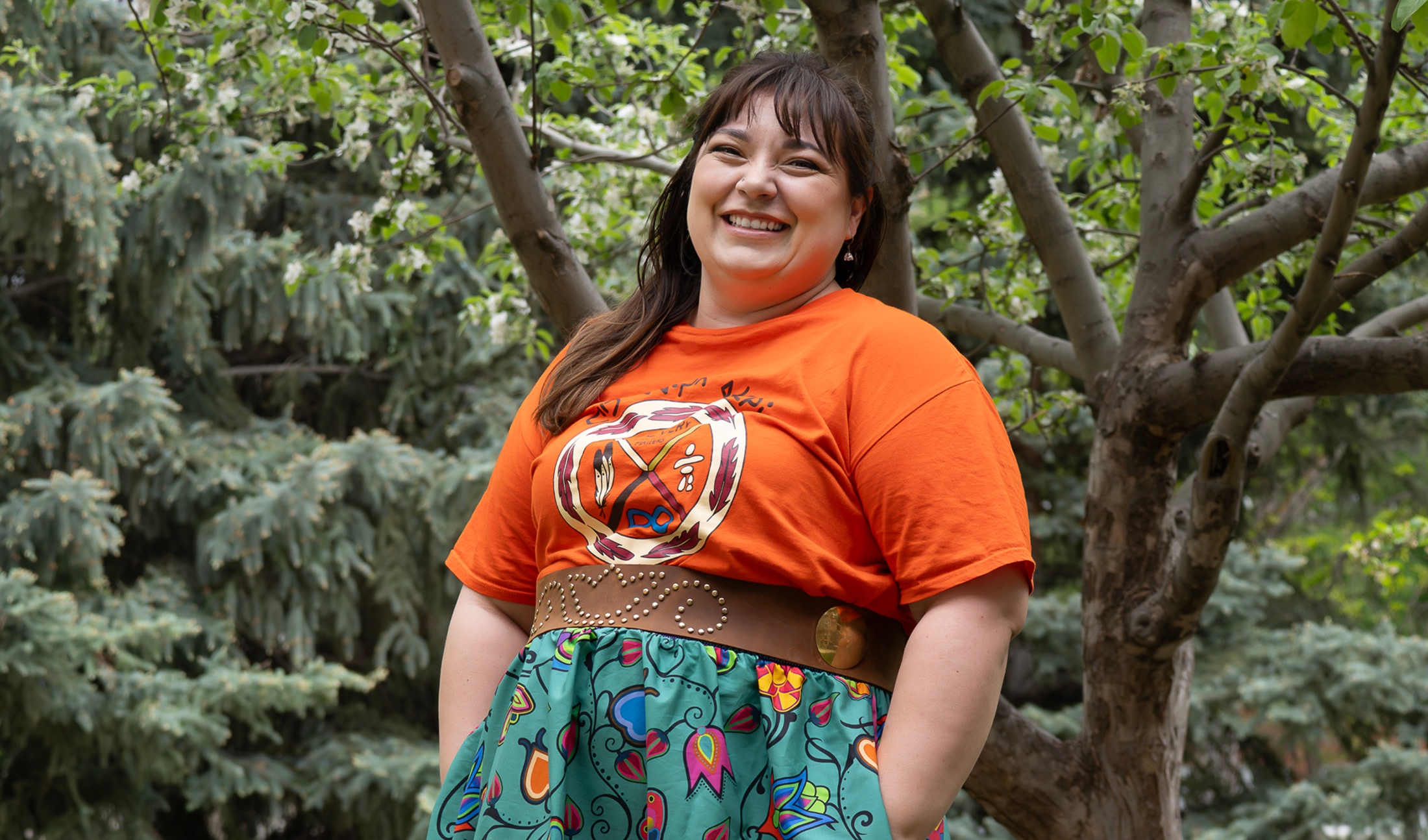 Featuring student Denée standing at UofA