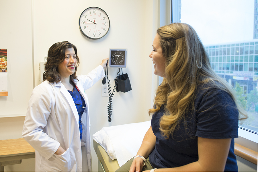 Dr. Andrea Haqq and a trial patient in the CRU