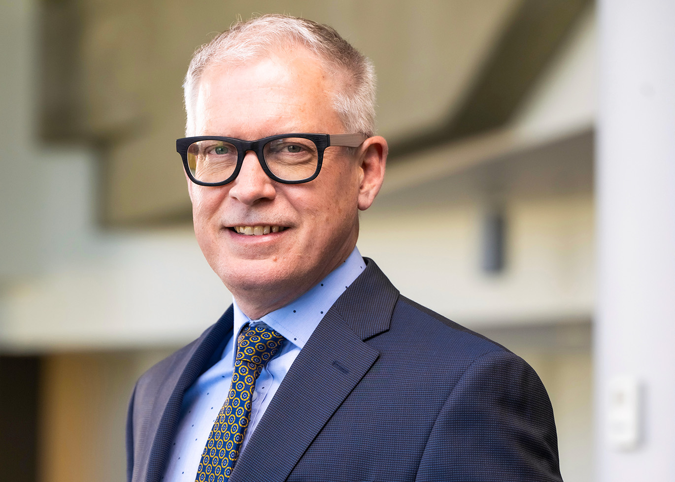 Portrait headshot of Augustana dean John Perkins