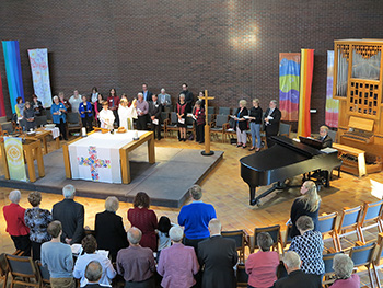 A group of people partaking in communion