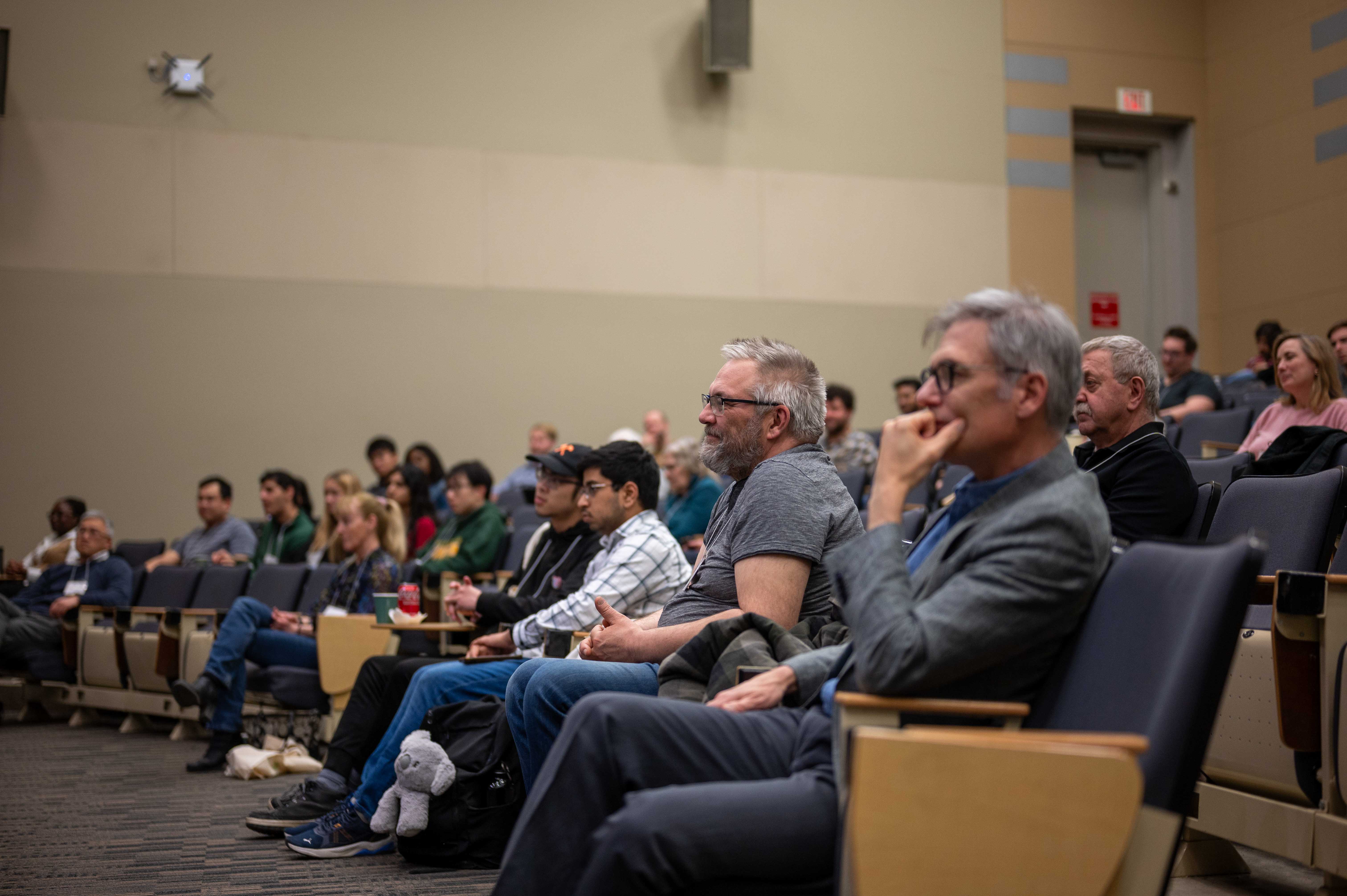 audience listening to a speaker