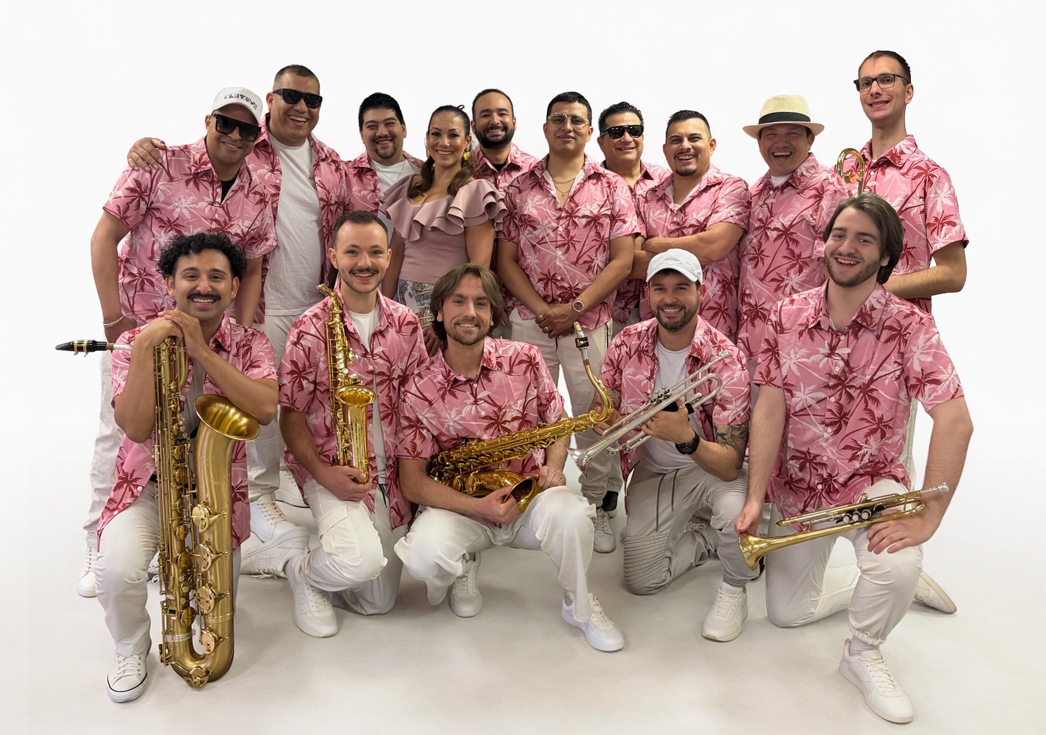 Orquesta Son Romera salsa band in pink outfits