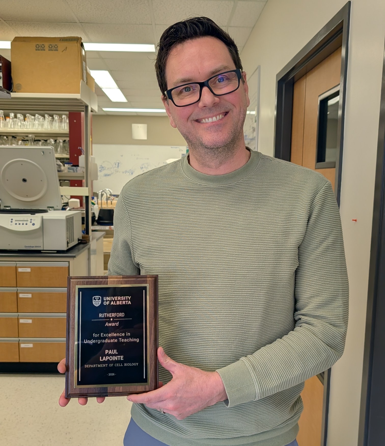 Dr. Paul LaPointe with his Rutherford Award