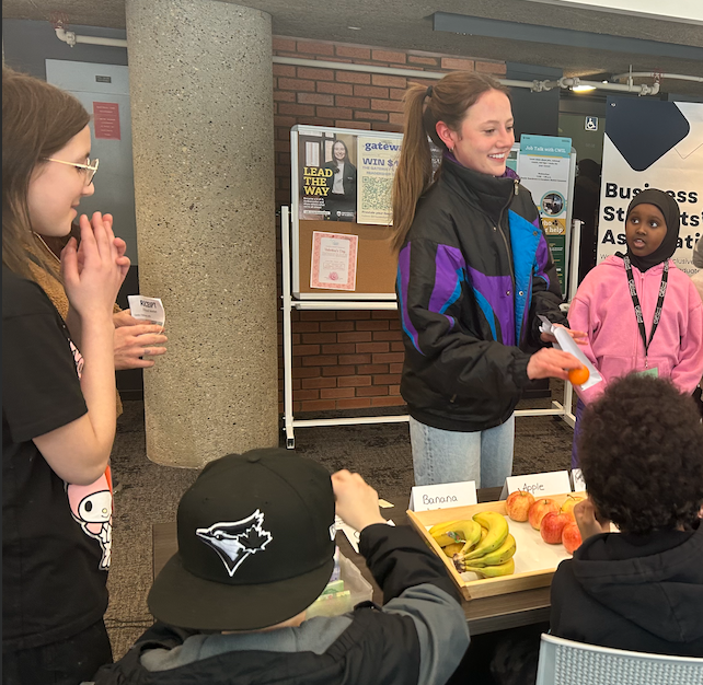 Marie volunteers with U School