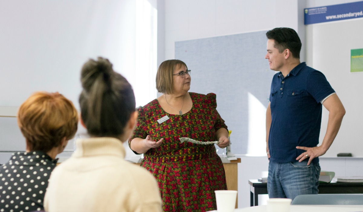 Aaron talking to Secondary Education Chair, Florence Glanfield