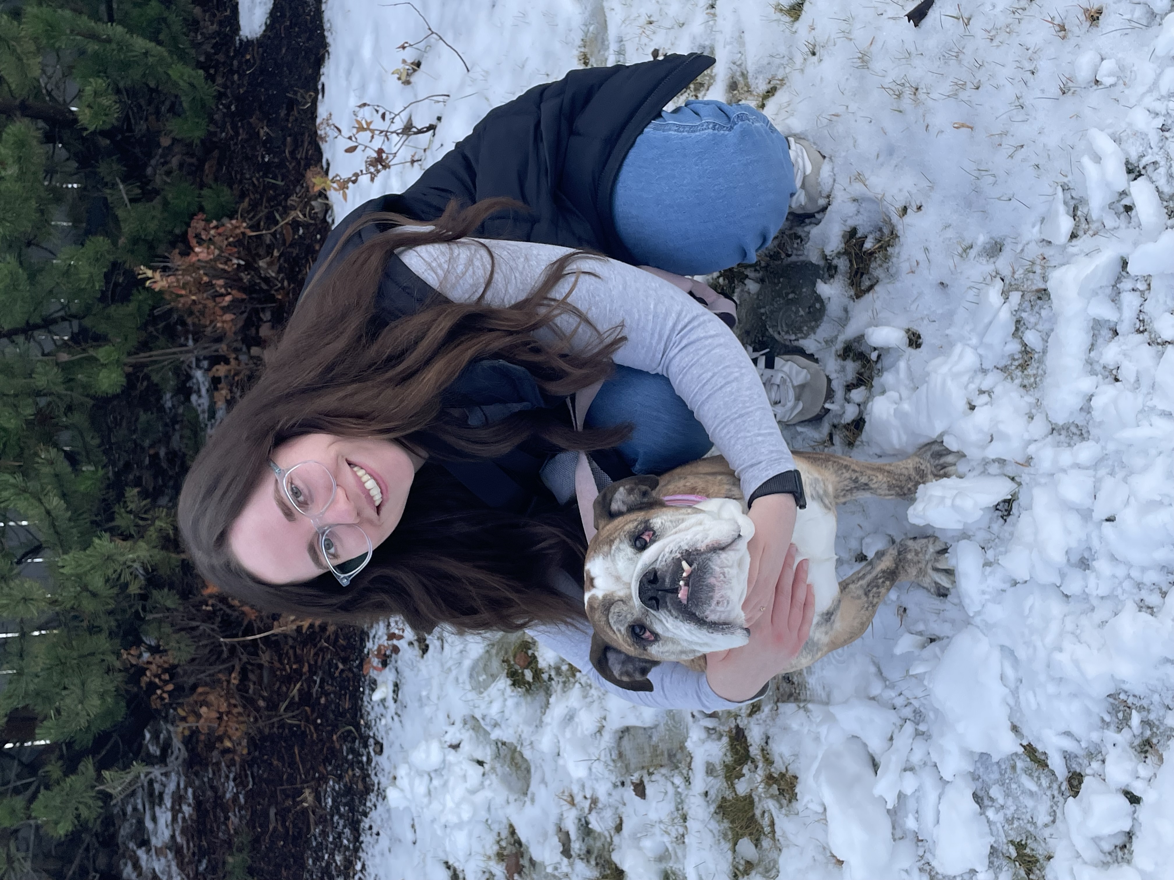 Keanna and her dog, Vera, outside in the snow.