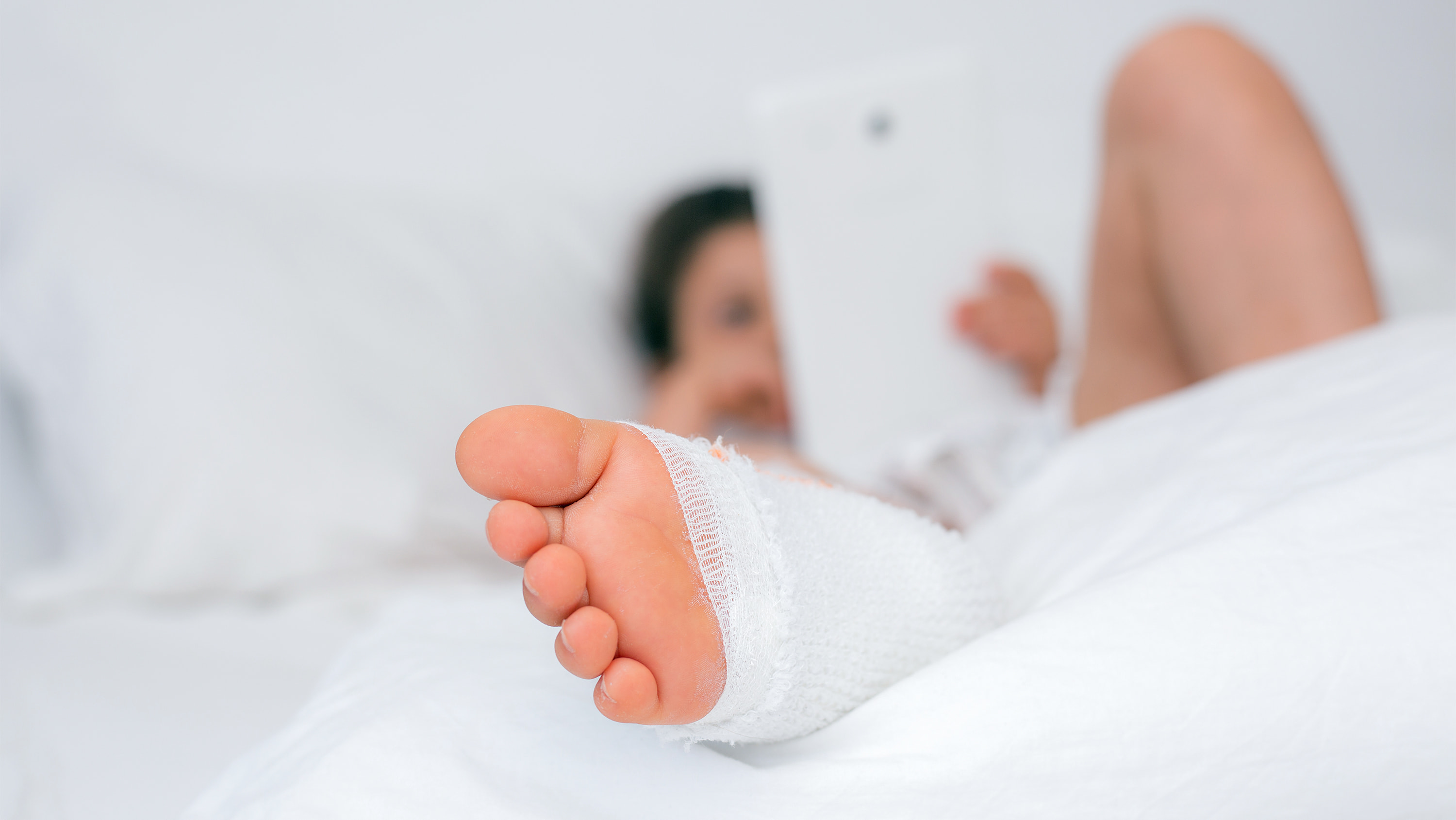 A closeup of a foot wrapped in gauze. (Photo: Getty Images)