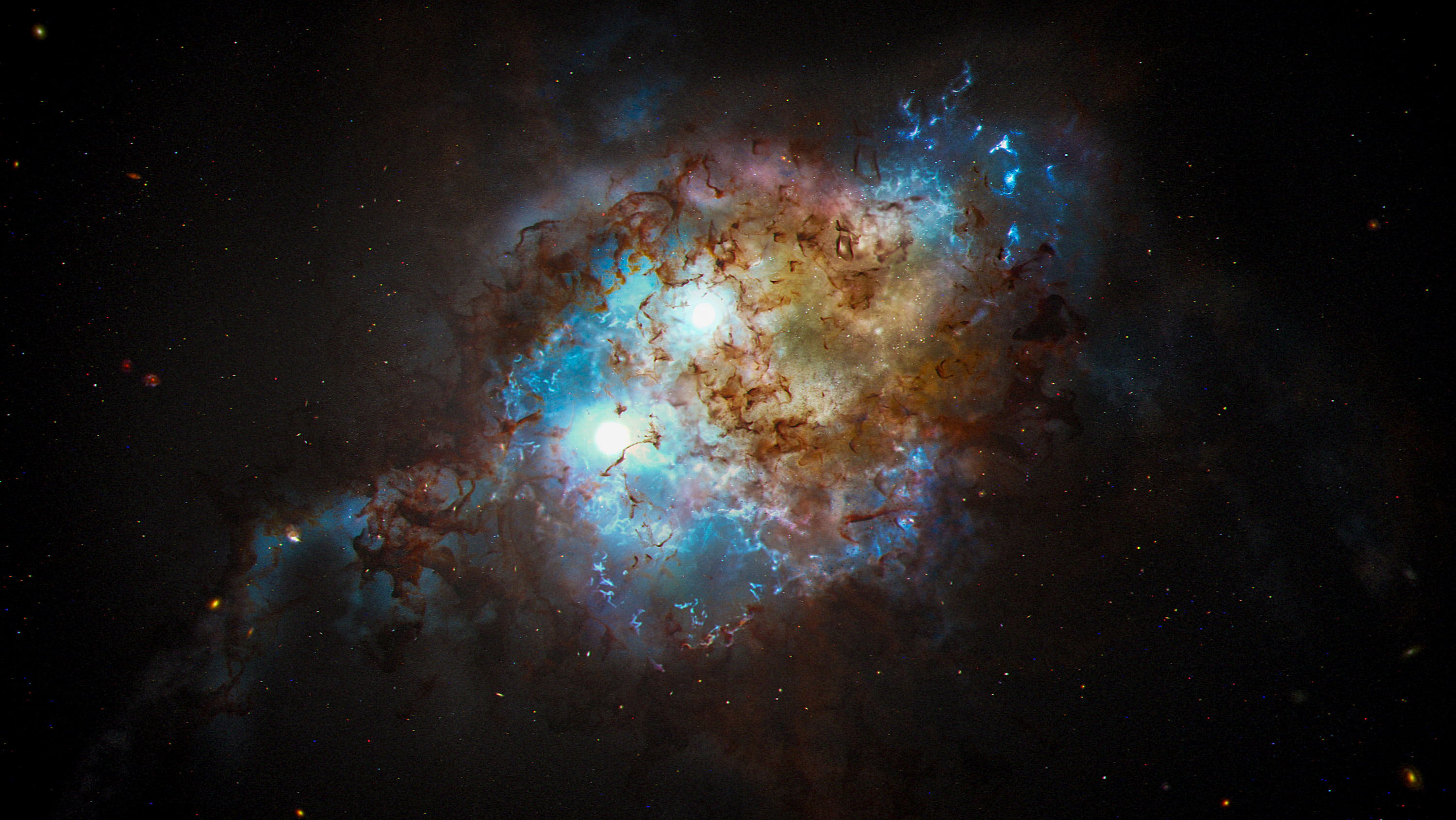 Artist’s conception showing the intense light from a pair of quasars in the cores of two galaxies in the process of merging. (Illustration: NASA, ESA, Joseph Olmsted [STScI])