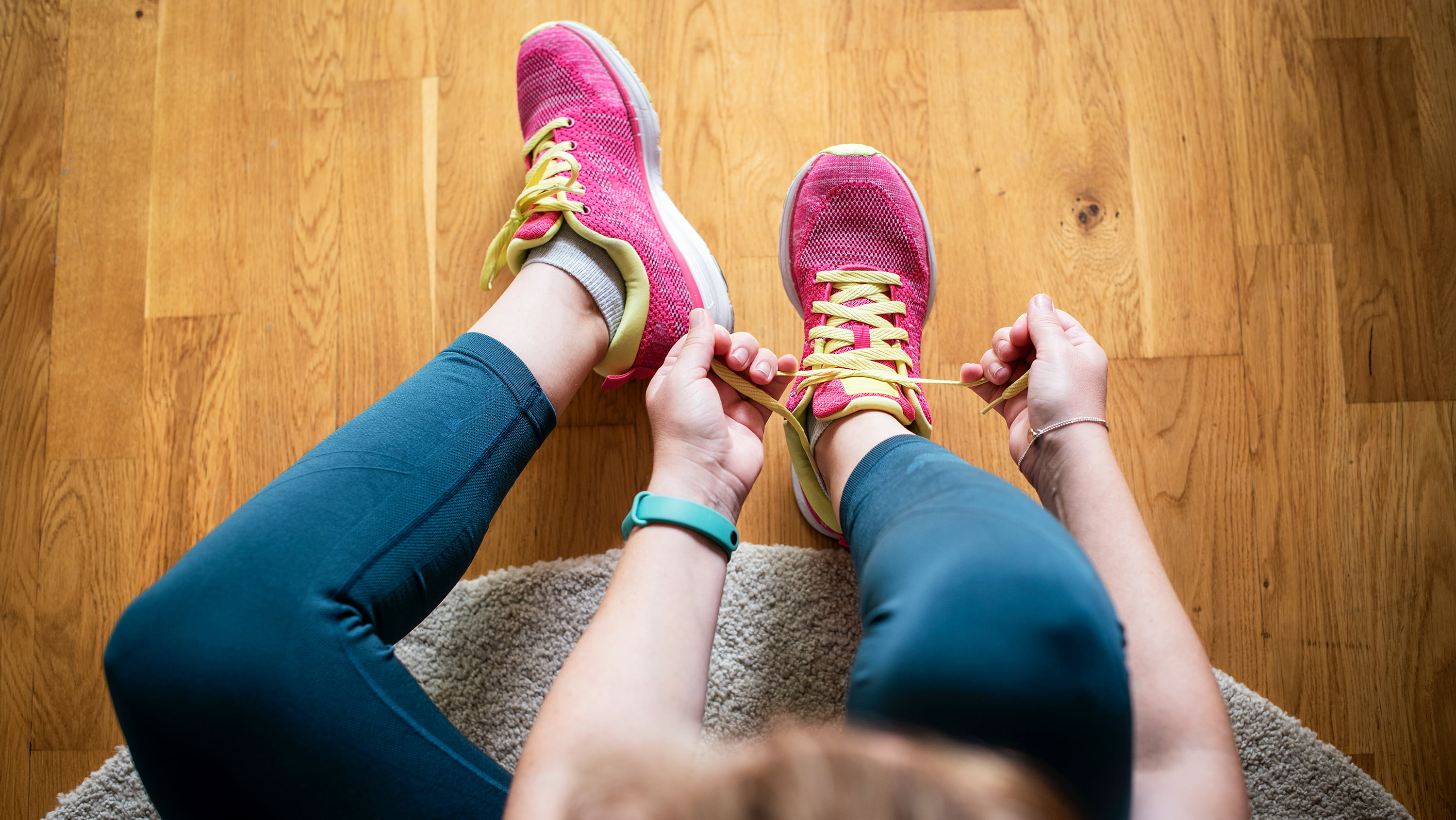 A photo of someone tying their running shoes. (Photo: Getty Images)