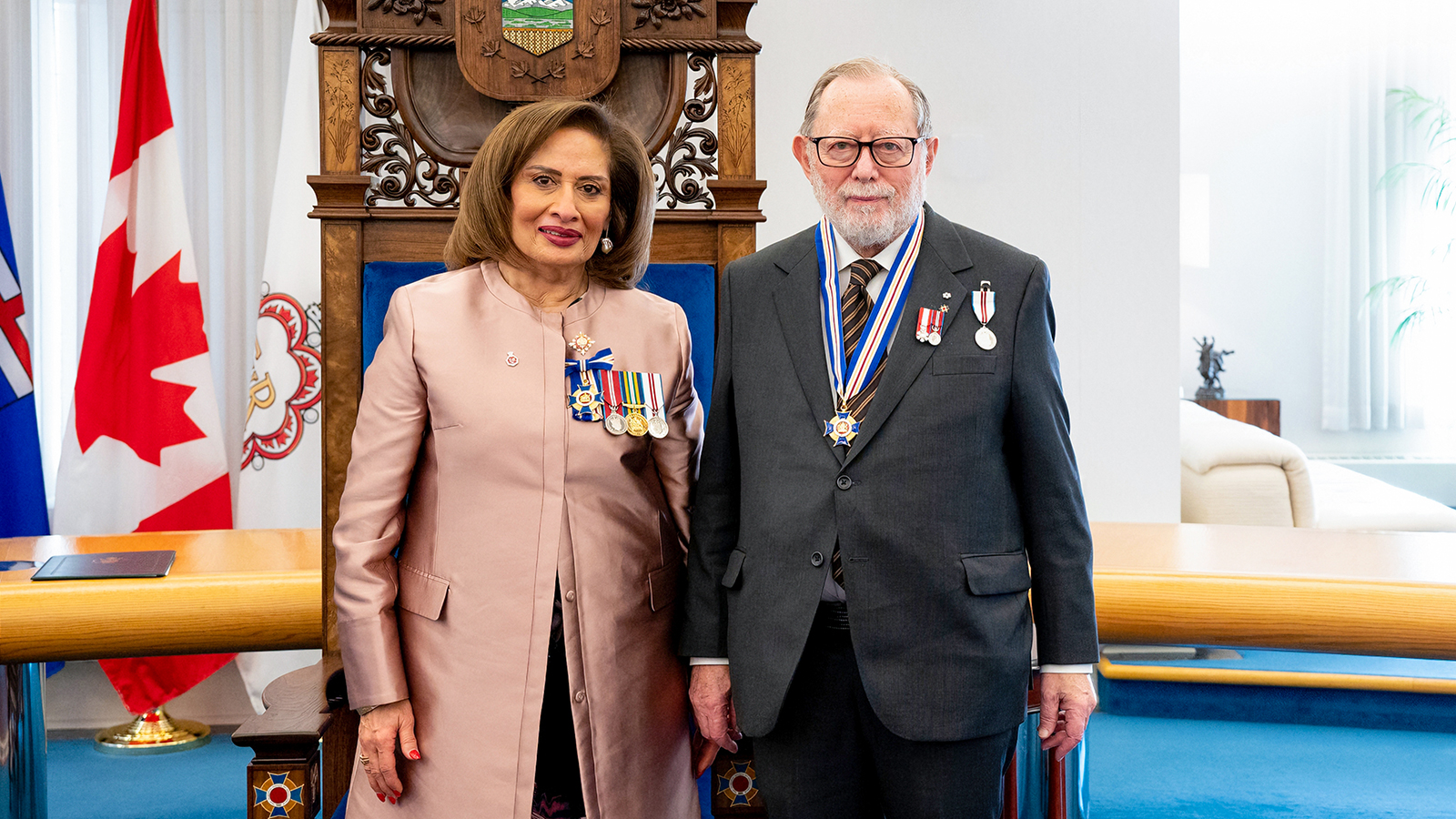Irving Kipnes receives the Queen’s Platinum Jubilee Medal from Alberta Lieutenant Governor Salma Lakhani in 2022.