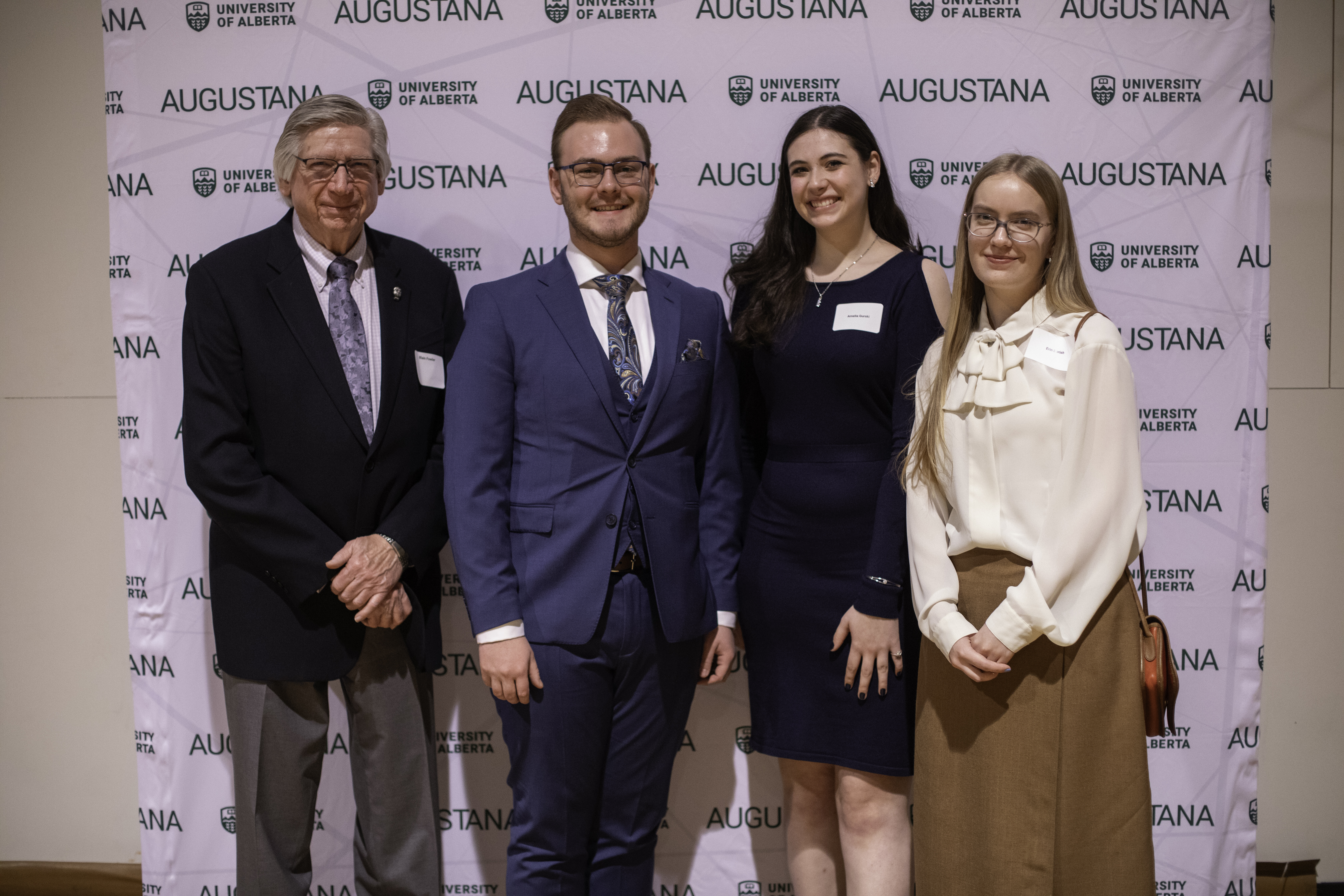 Blain Fowler (left), pictured with Augustana student award recipients Chad Nichol, Amelia Gurski and Erin Dorish at the 2025 Community Awards Banquet, is carrying forward a 55-year tradition of giving alongside fellow Camrose donor Bart Orr of Burgar Funeral Home.