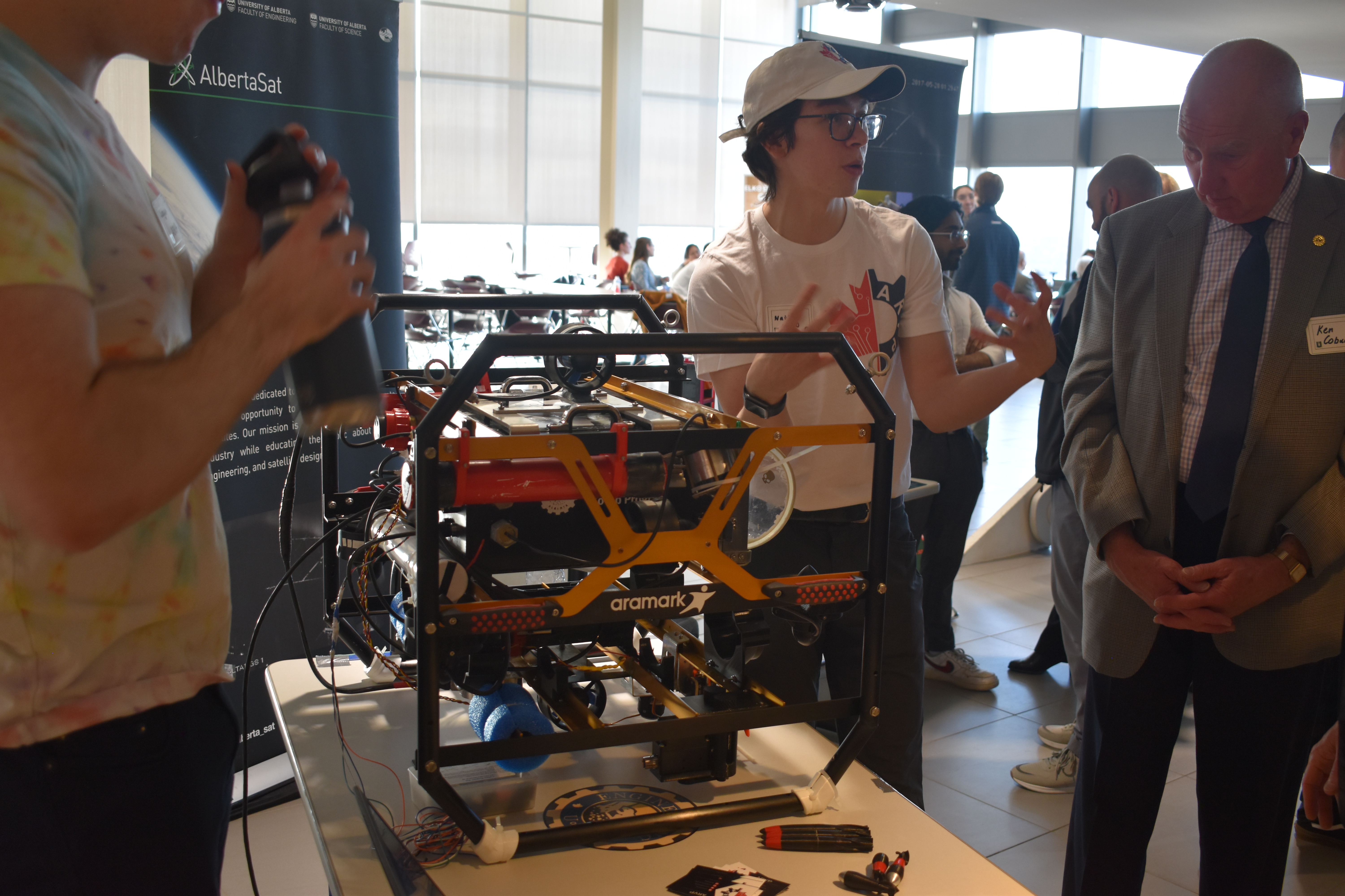Nathan Chong presenting Arctos, an autonomous underwater robot developed by the U of A’s Autonomous Robotic Vehicle Project. (Photo: Supplied)