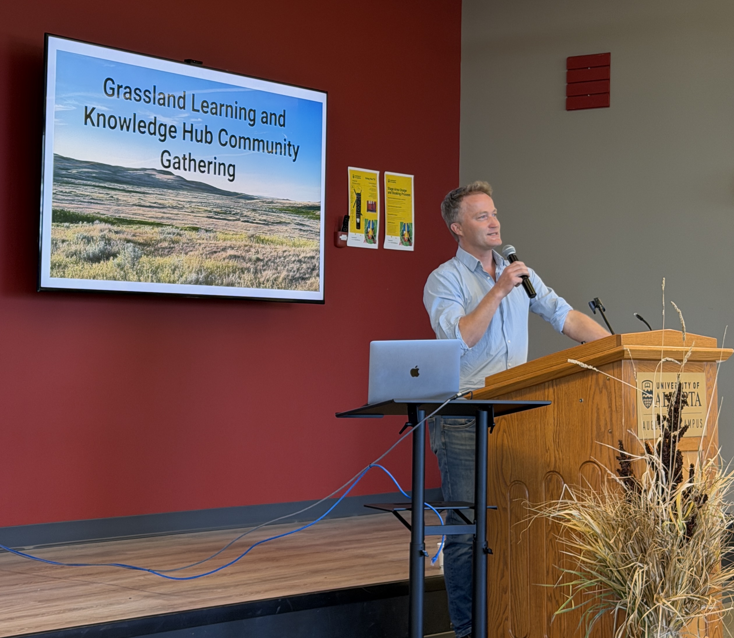 Pictured here: the GLKH's principal investigator, John Pattison-Williams, delivering the open remarks.