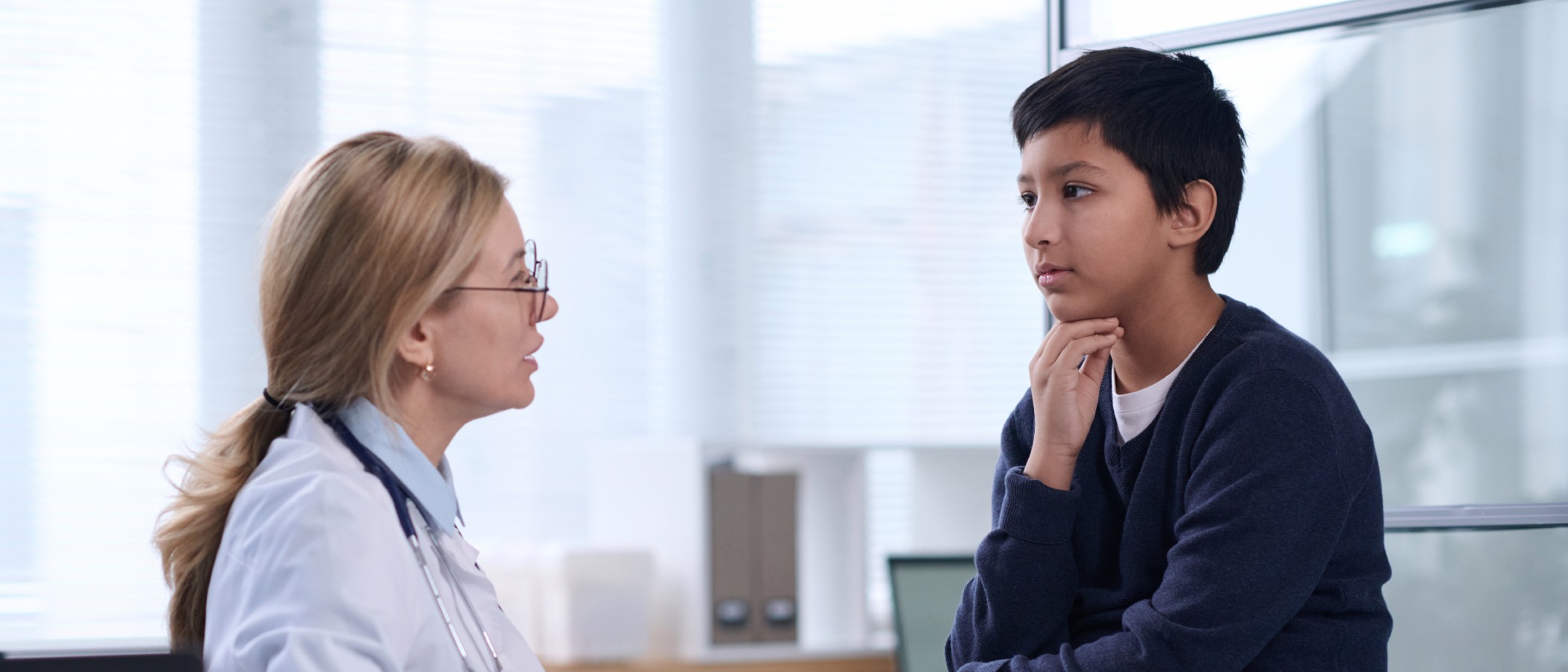 Doctor and child patient in a doctor office