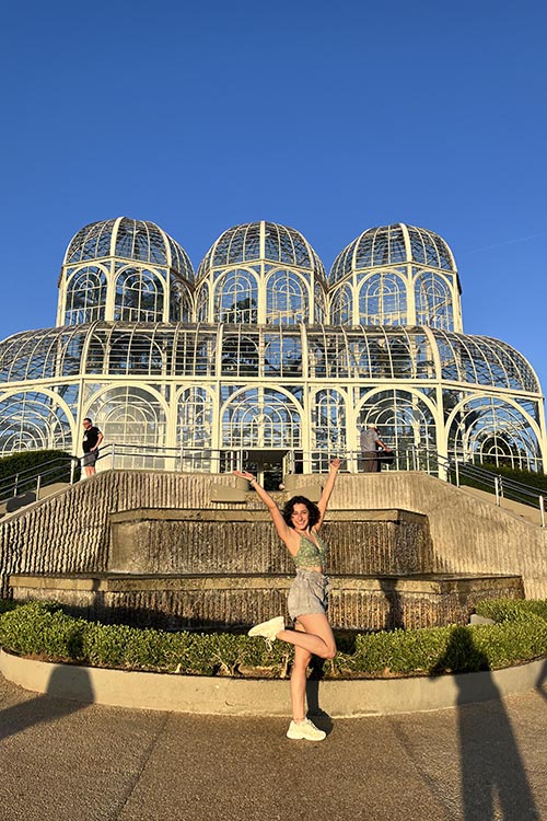 Estefania in front of The Botanical Garden of Curitiba, housing Paraná’s native flora