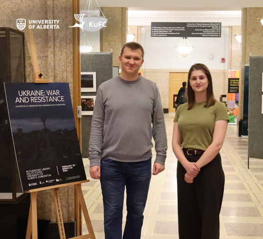 Dmytro and Andriyka in front of the exhibition