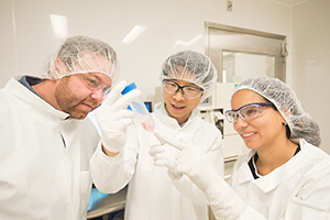 Three scientists in a lab