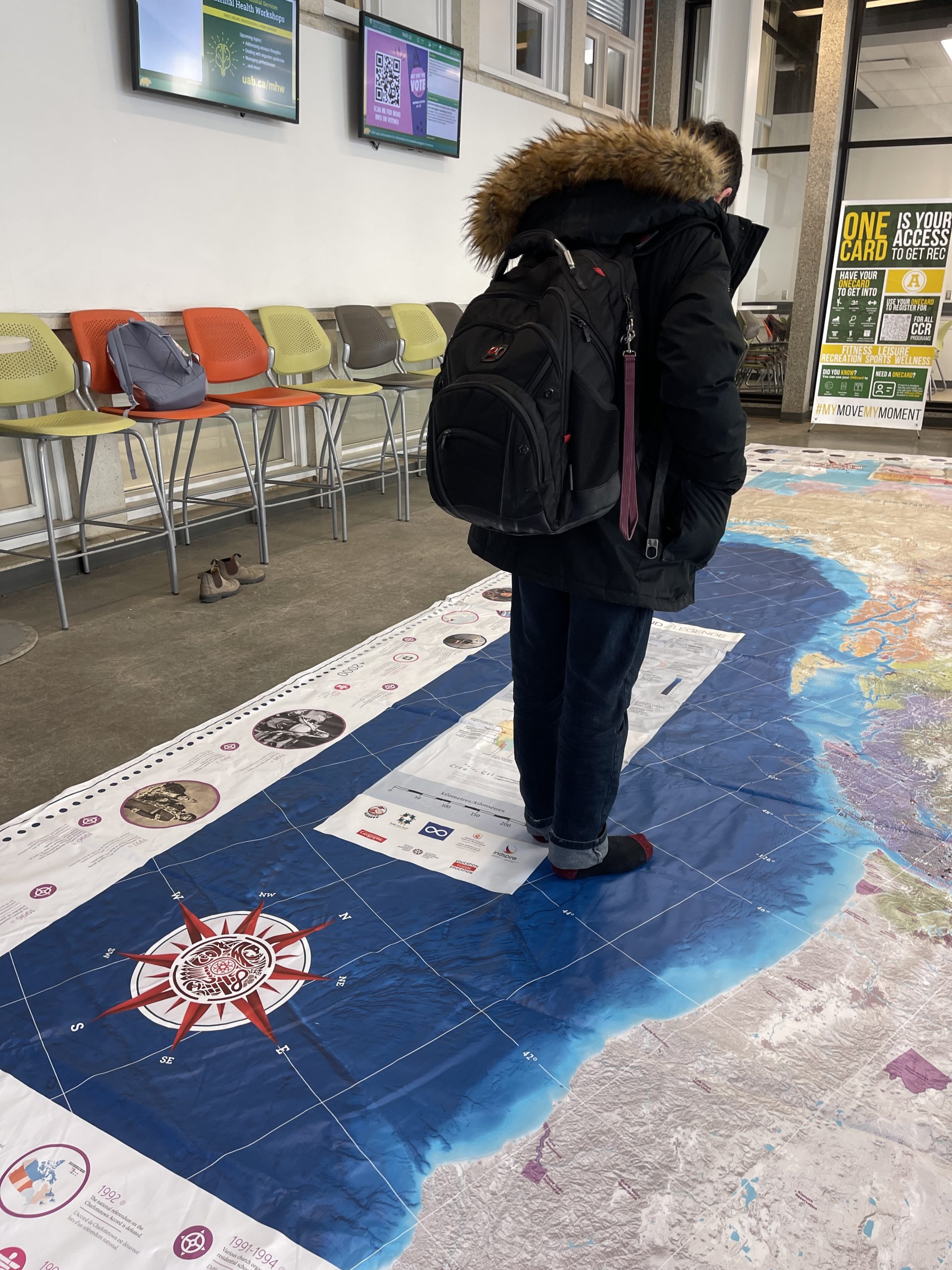 person standing on a map