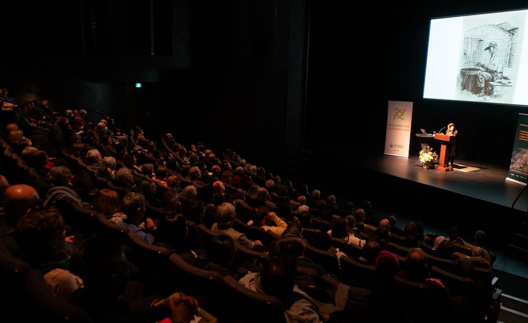 Photo of Kate Beaton Presenting the 2024 Kreisel Lecture to a Full Audience