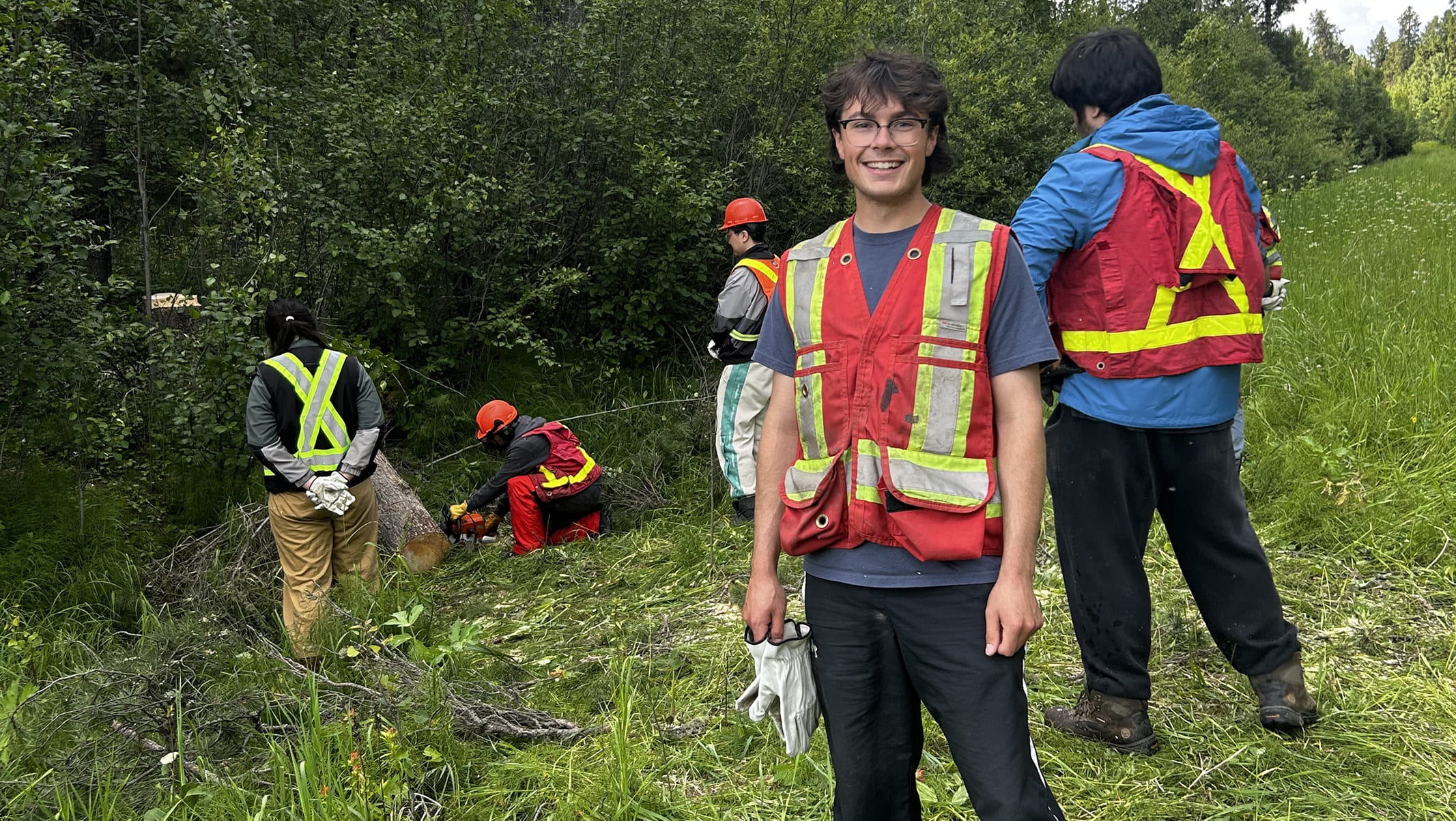 Intern taking samples from a field