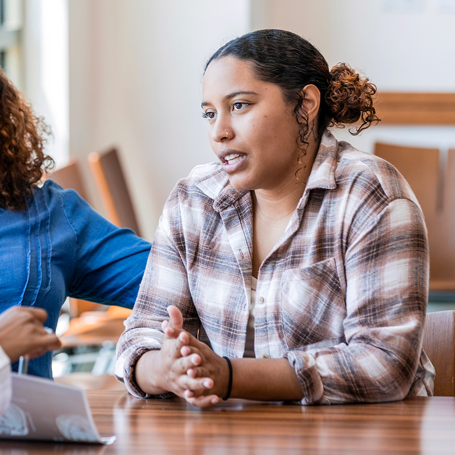 Image shows patients consulting a doctor