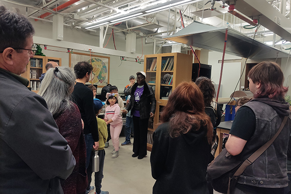 An undergraduate student demonstrates how Ground Penetrating Radar surveys work to children participating in the 32nd annual APEGA Rock & Fossil Clinic at the University of Alberta. Photo courtesy of APEGA.