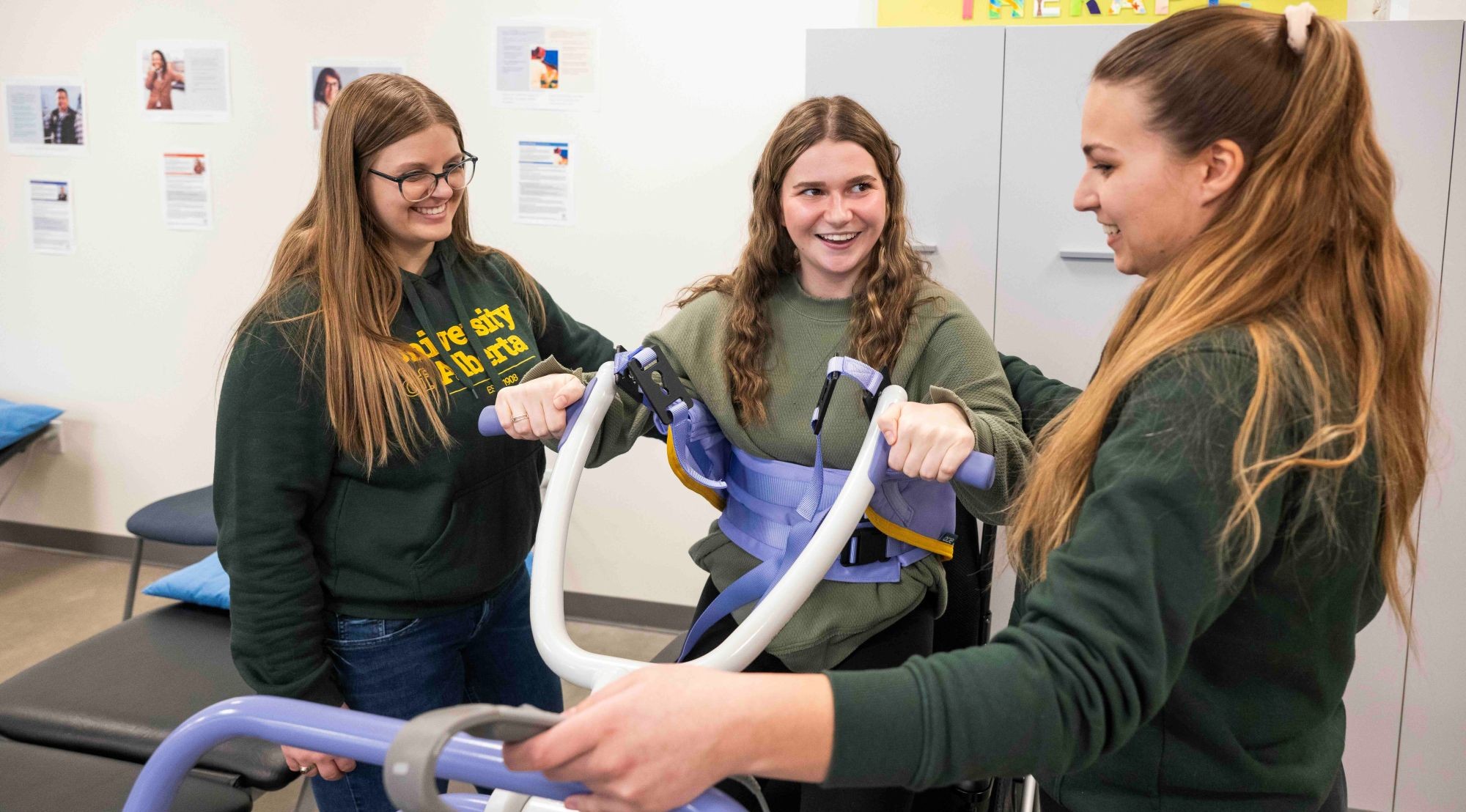 Two occupational therapists working with a patient