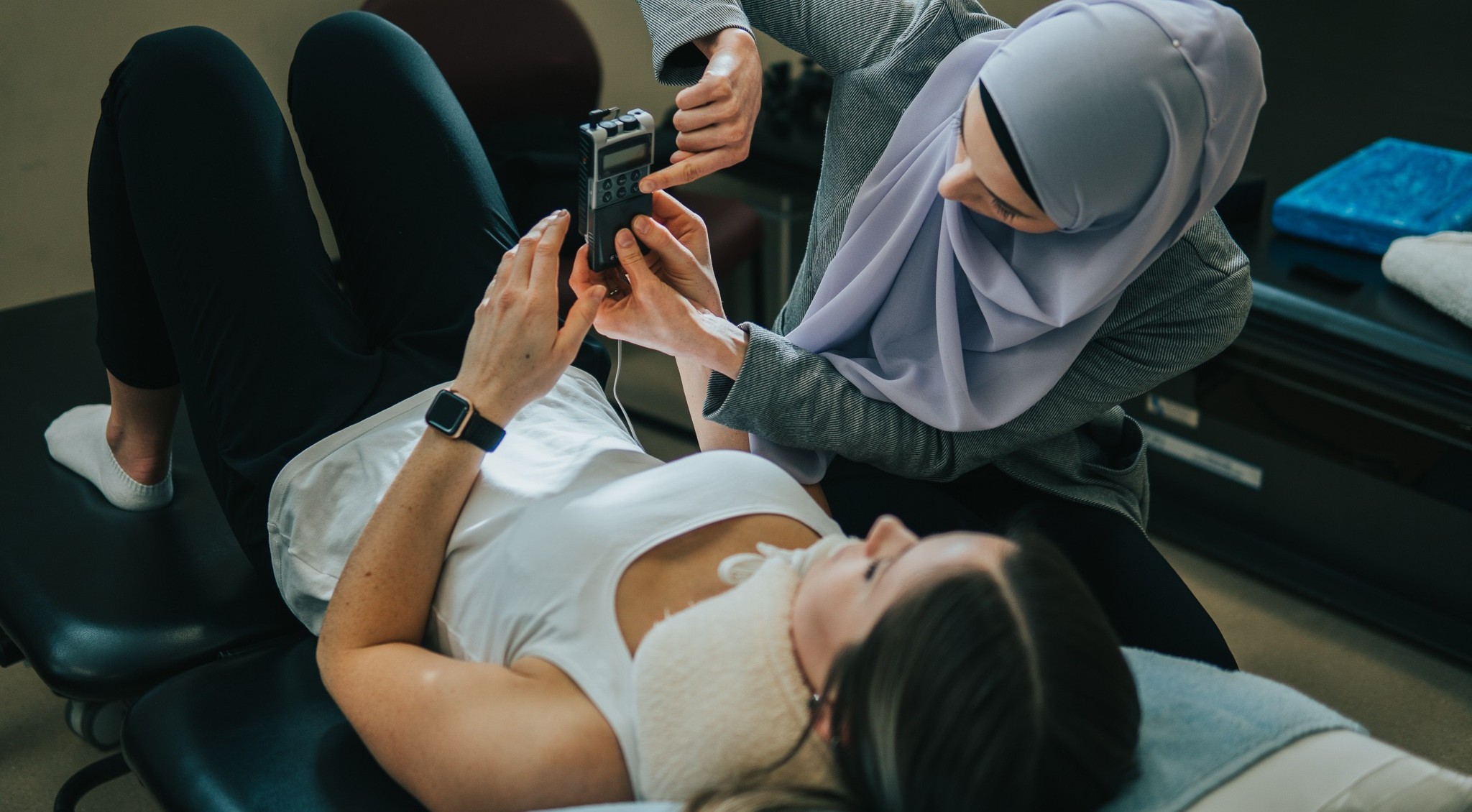 A woman receiving physical therapy