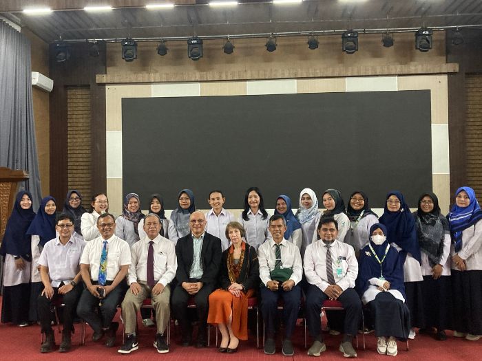 Faculty at Surakarta Health Polytechnic gather with Professors Shaniff Esmail and Sharon Brintnell.