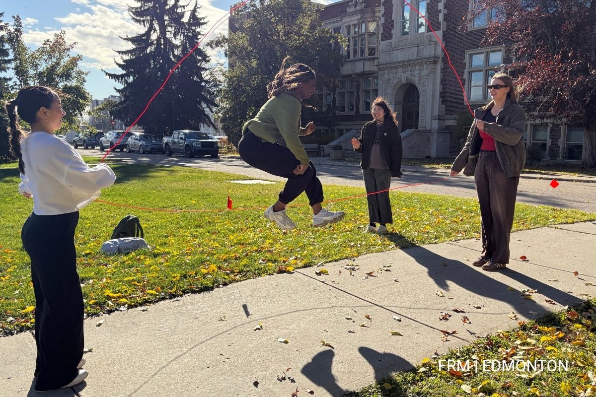 Students jumping rope outside Corbett Hall