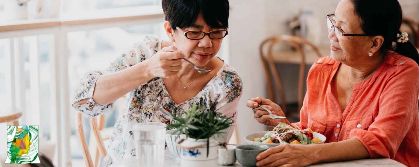 Two people eating a meal together