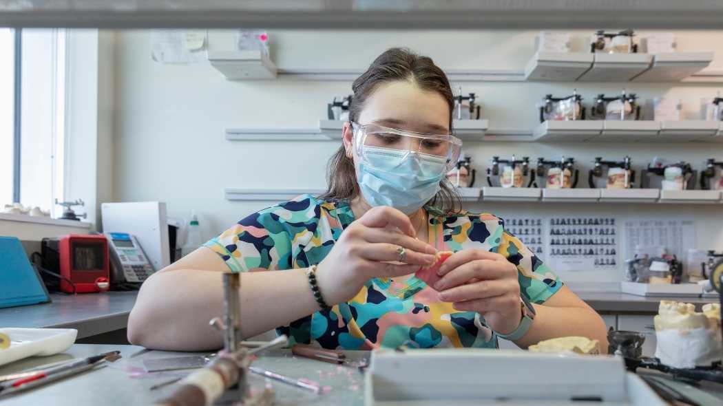 Technican working on dentures