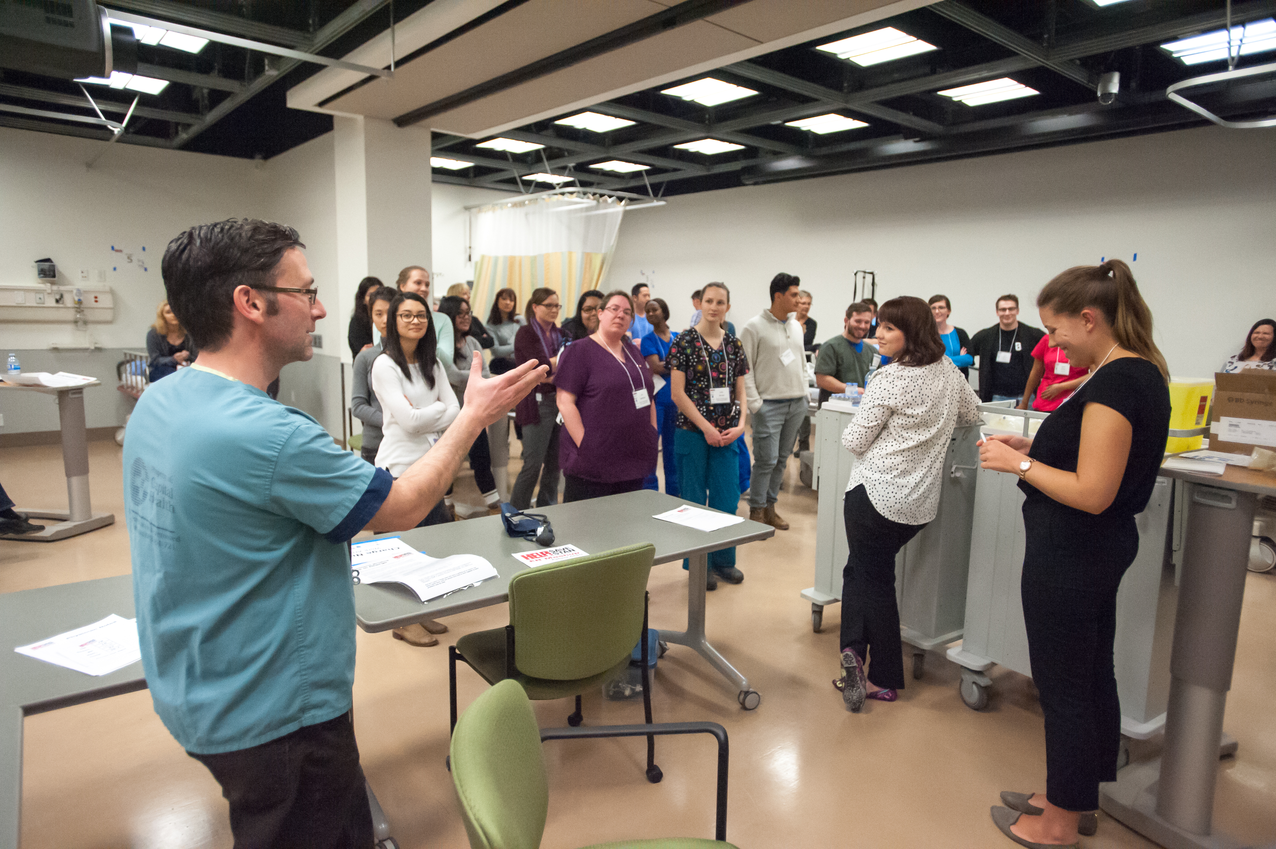 A medical or health sciences student interacting with community members.