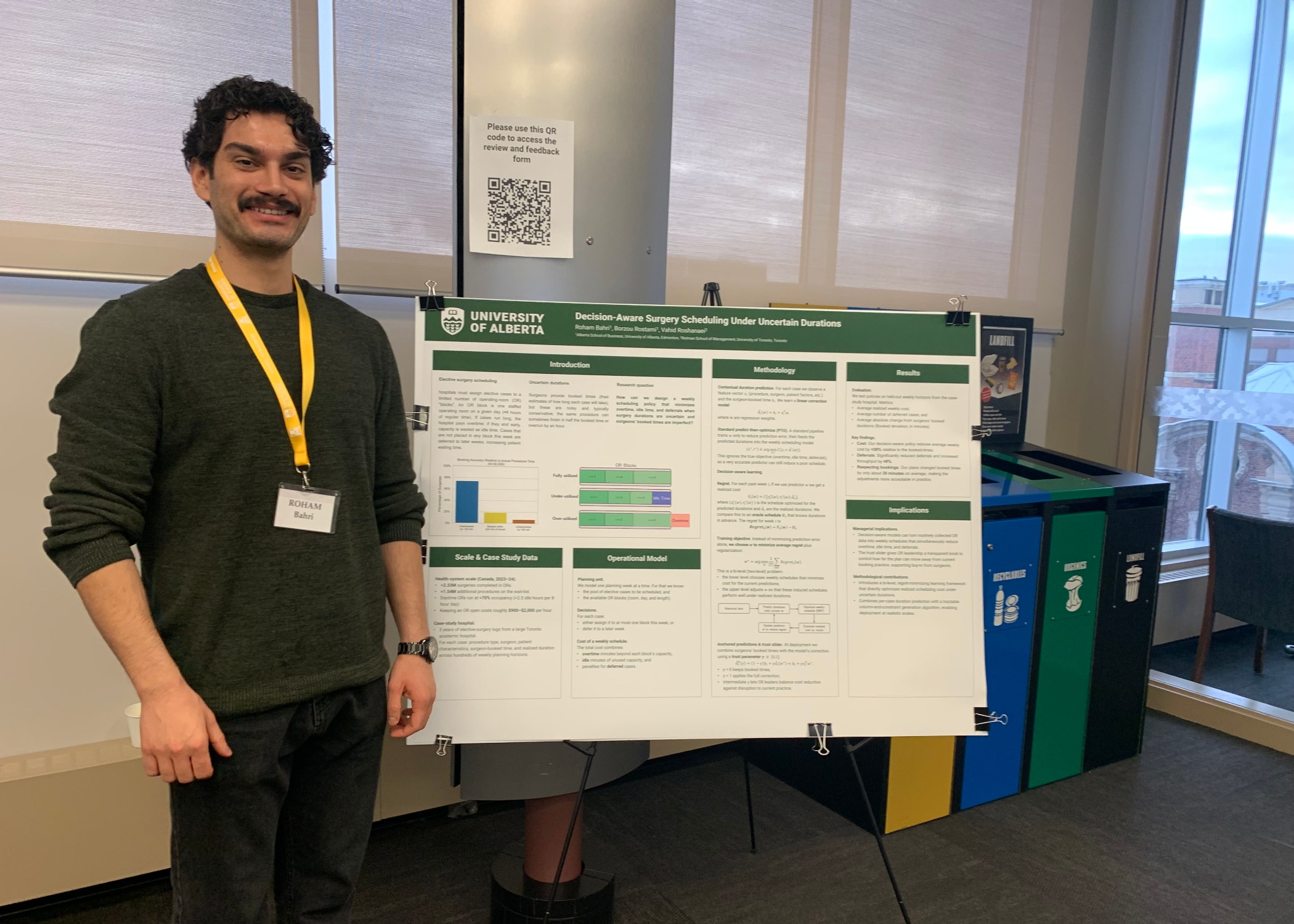 Second year operations and information systems PhD student Roham Bahri and his winning poster that presents research on how hospitals can more efficiently schedule surgeries.