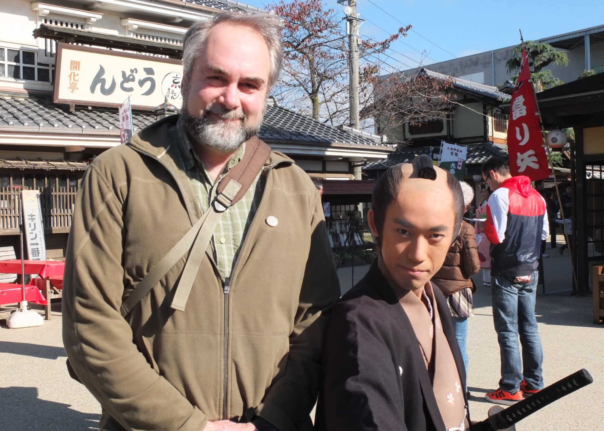 Dr. Geoffrey Rockwell, posing with a samurai cosplayer at the 2011 Uzumasa Sengoku Festival.
