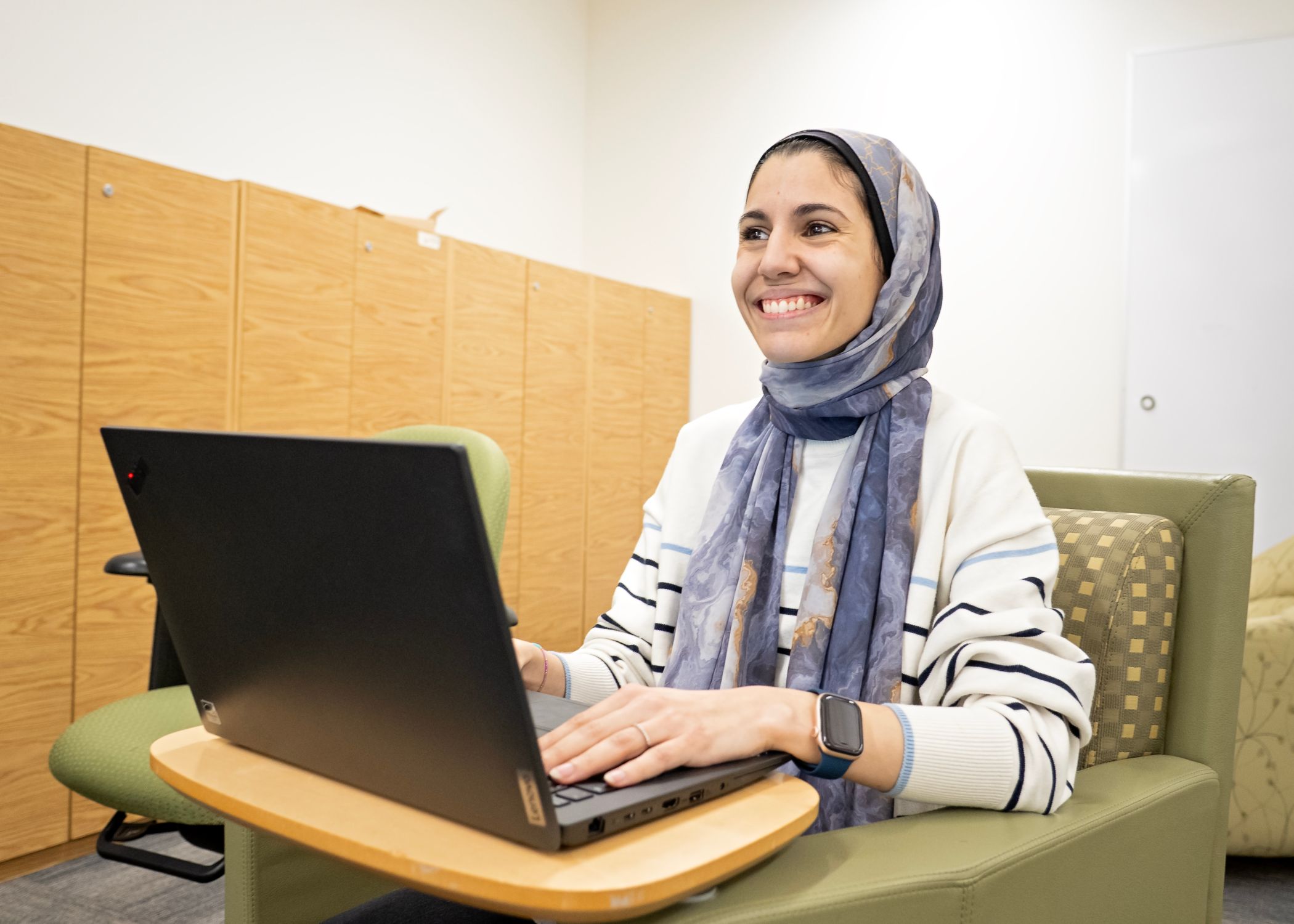 Graduate research assistant fellow Amira Saleh works on data analysis and computational research.