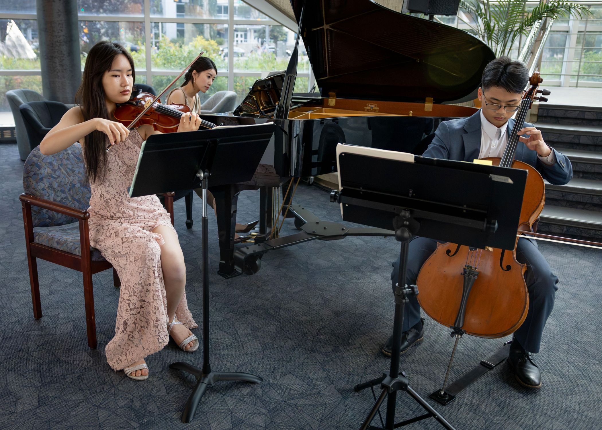 Anthony Yue (cellist), Jessica Zhuang (violinist) and Ka Yuk (Rose) Yam (pianist).