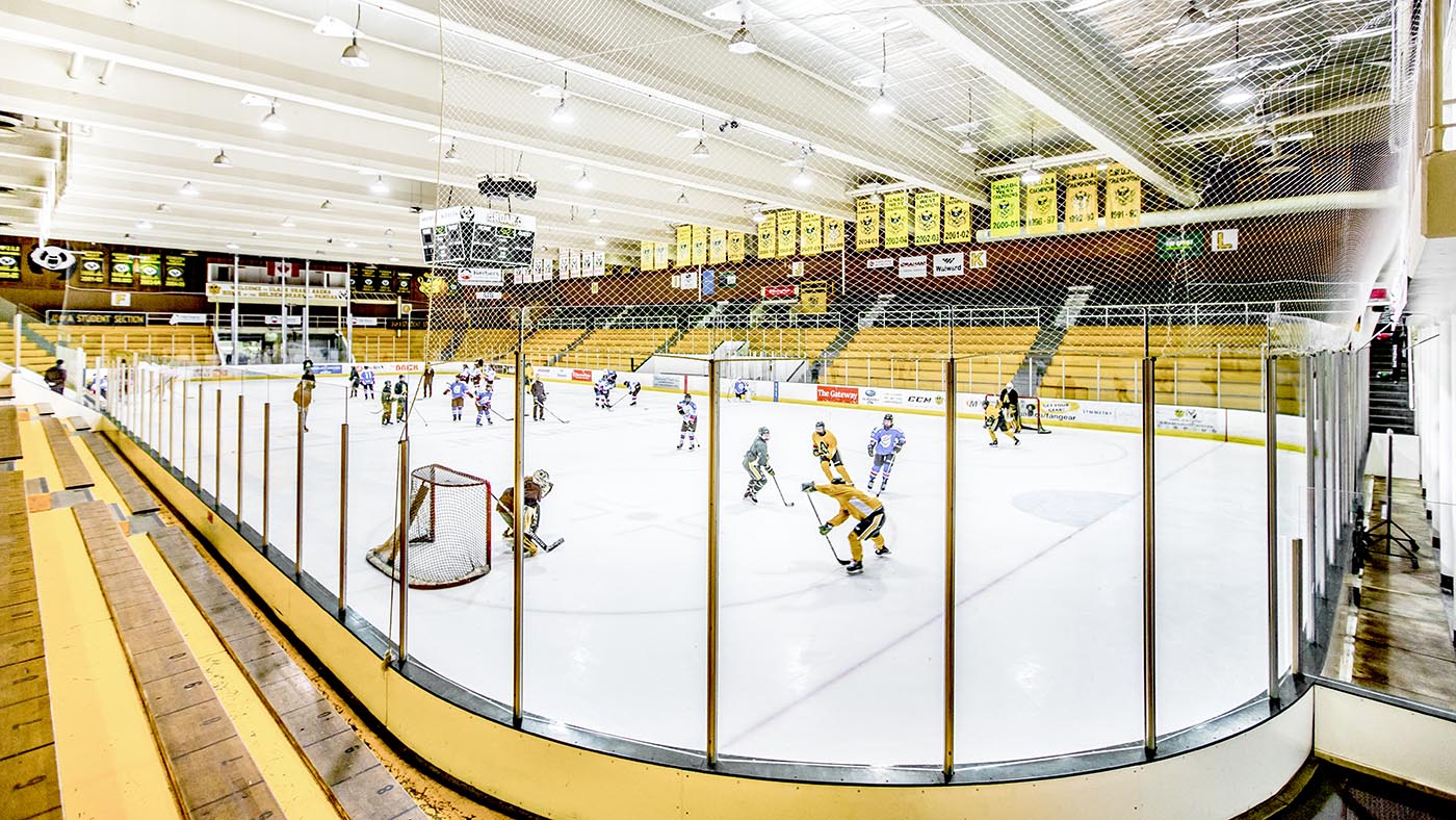 Student athletes on the ice at the Clare Drake Arena.