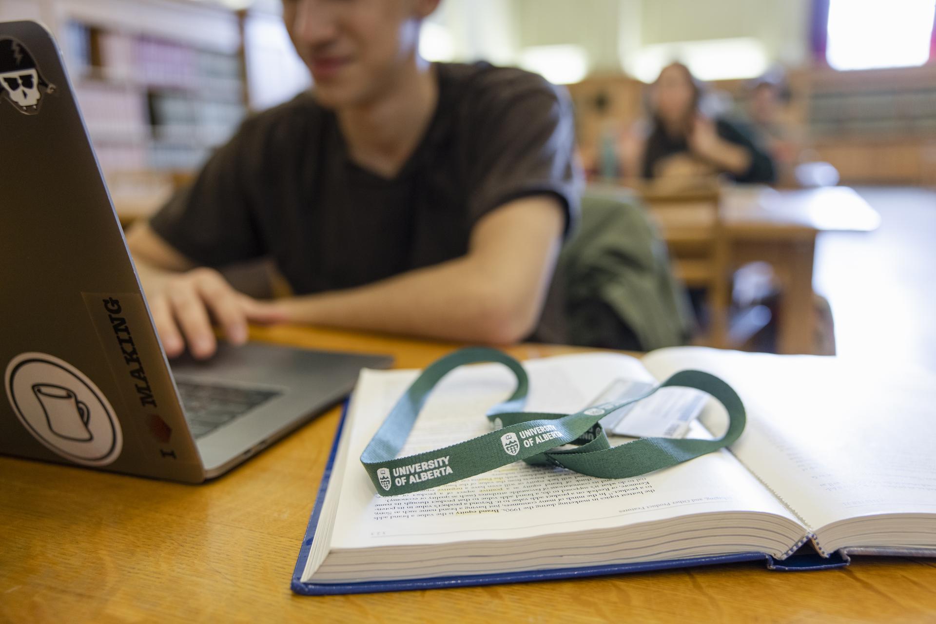 student in library