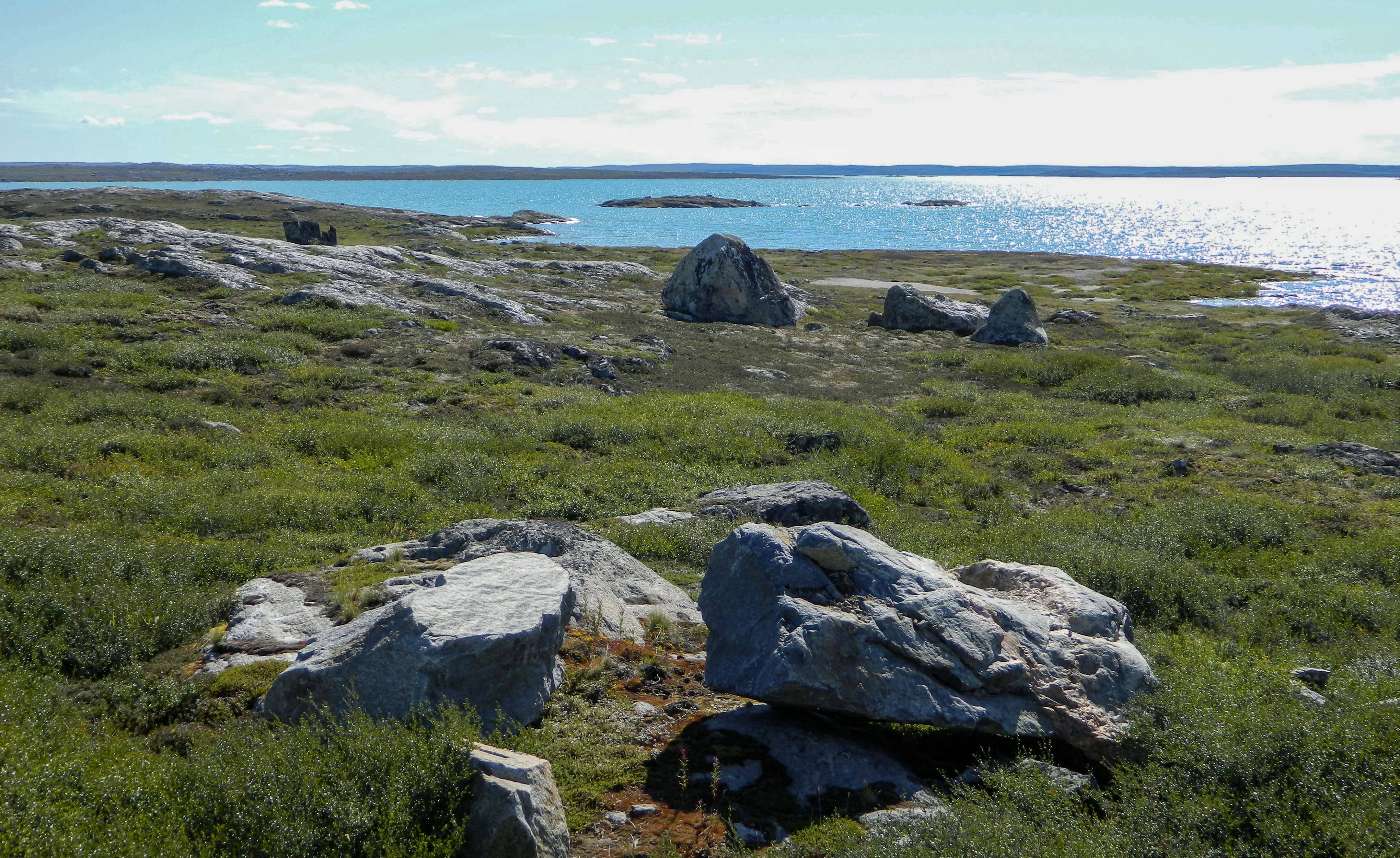Boulders on a field by a lake in the remote NWT