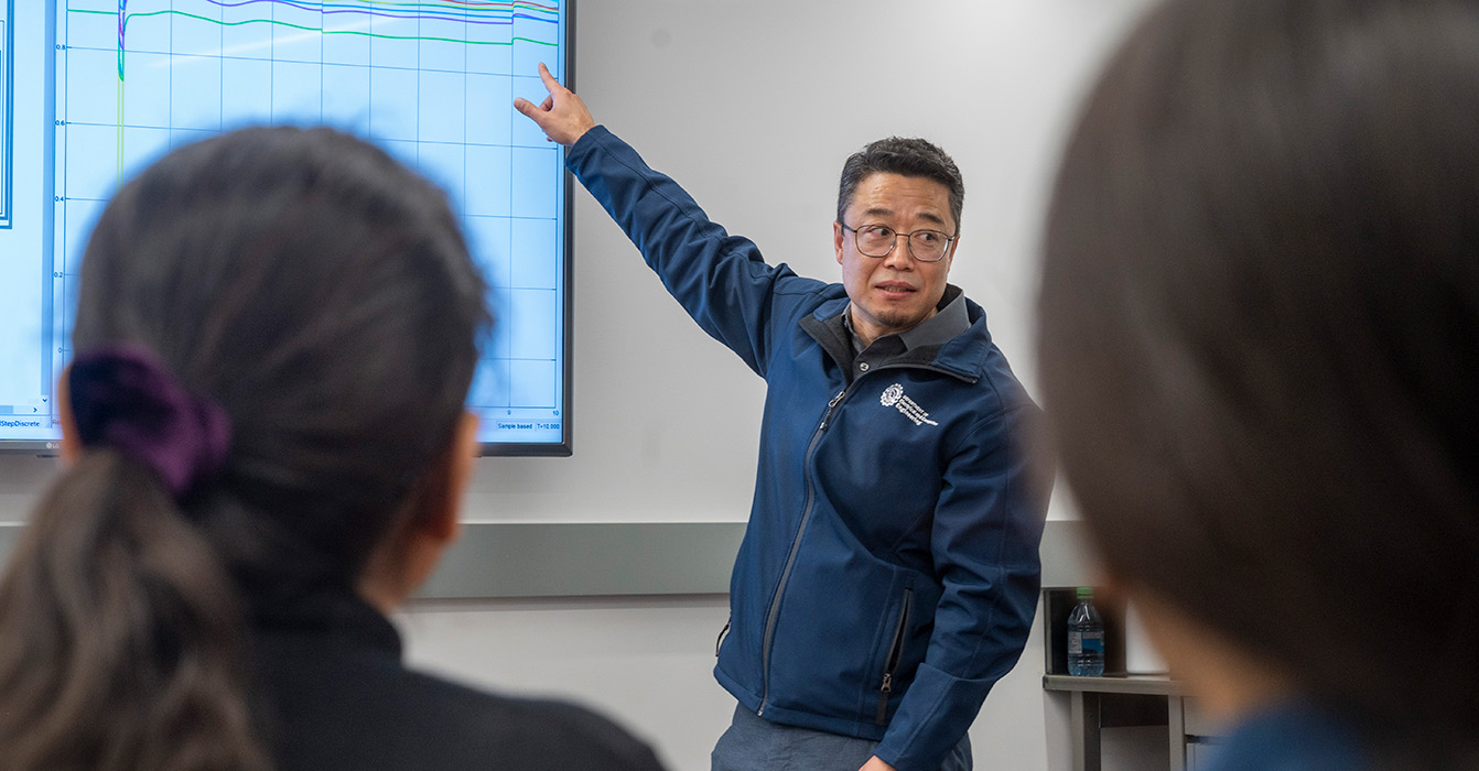 Prof Li teaches students in the MEng program.