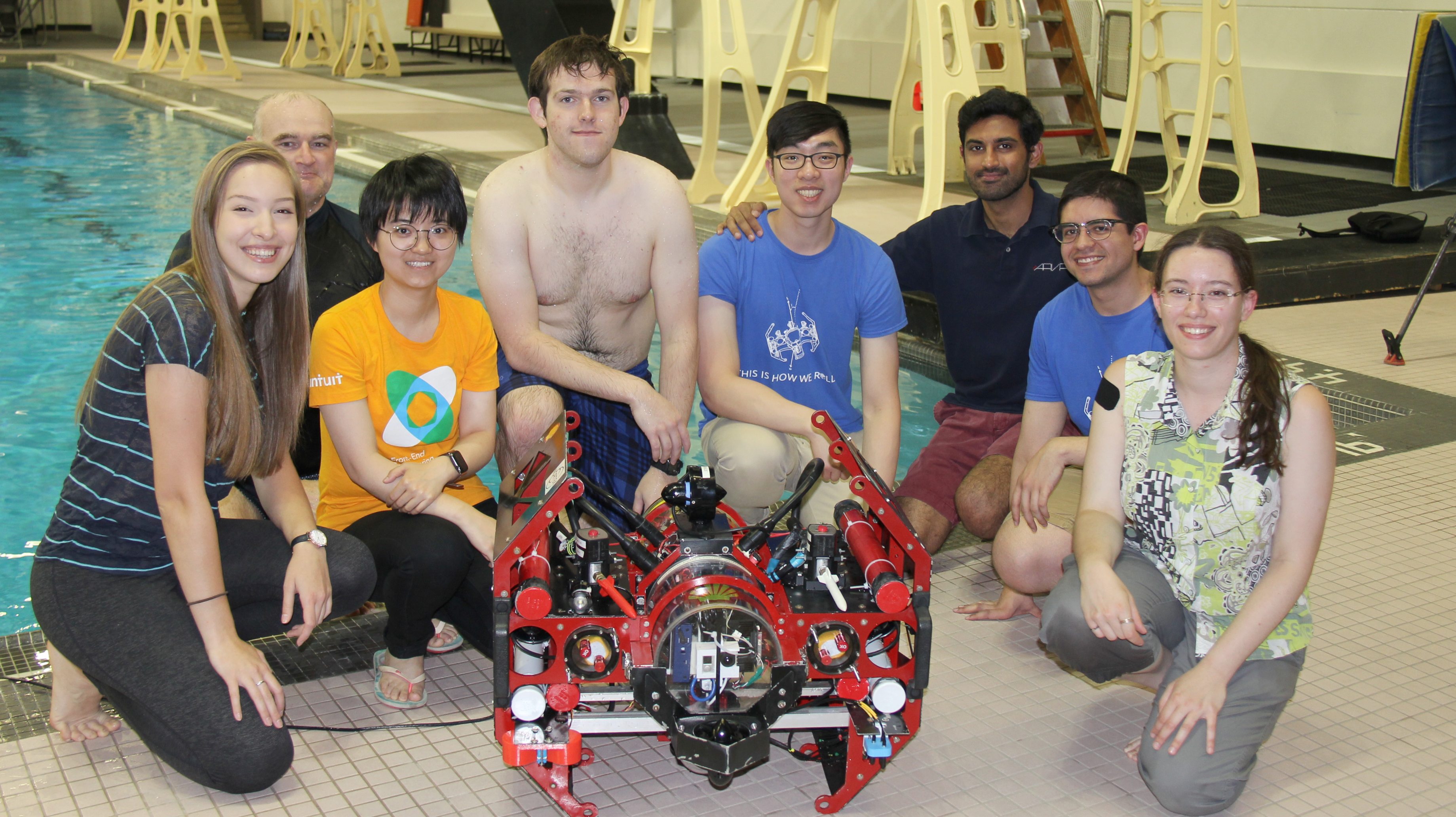 Members of the Autonomous Robotic Vehicle Project team with their robotic submarine, Auri 2.0
