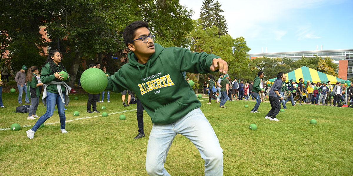 Students playing dodgeball in Quad